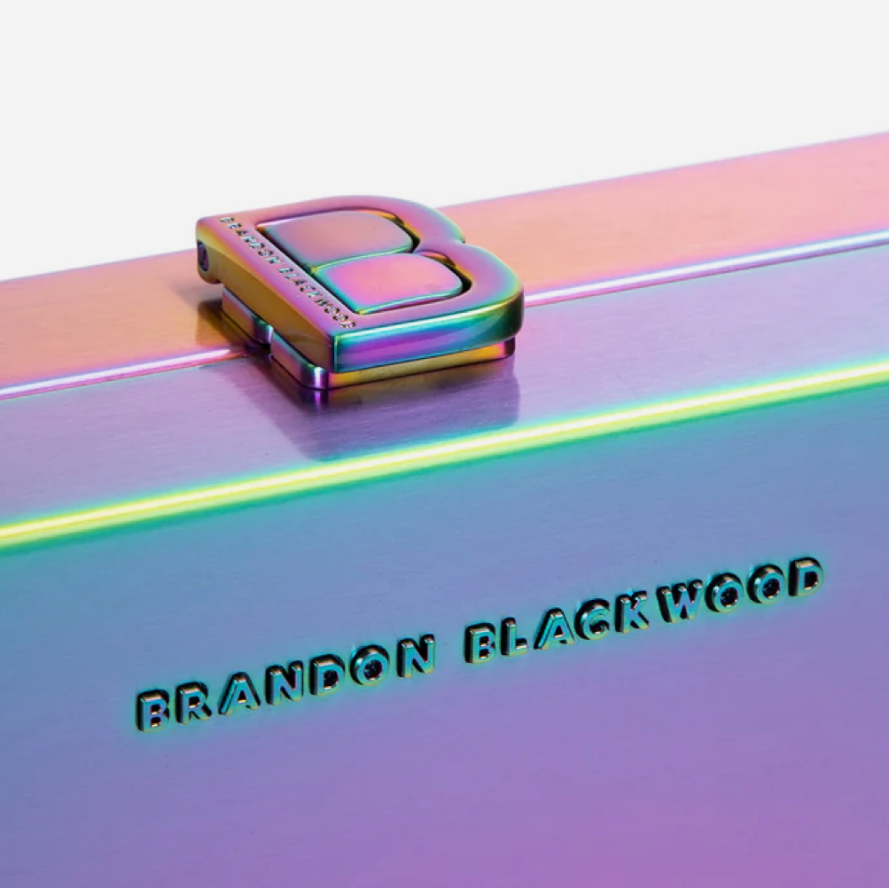 Top handle of the Brandon Blackwood Limited Edition Slim Clutch in Iridescent Stainless Steel