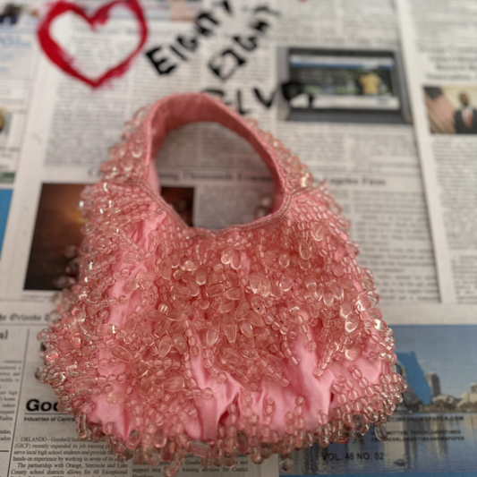 pink hand beaded purse